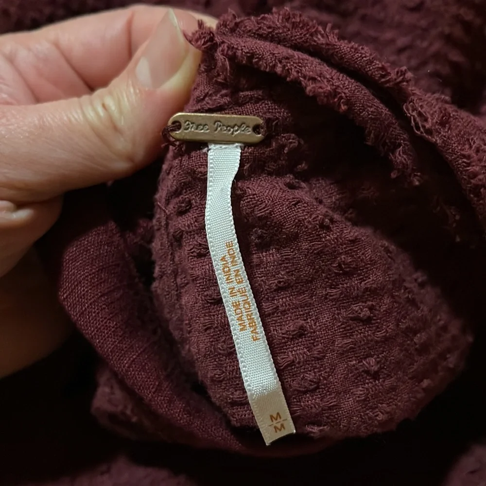 Free People Walking in Hueco Back Tie Long Sleeve Raspberry Cropped Top.
